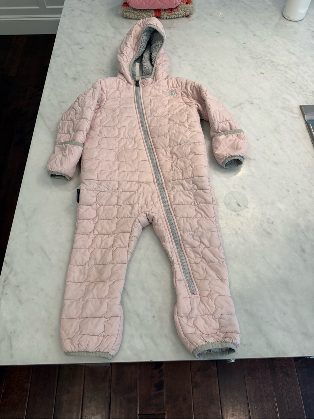 The North Face Light Pink Quilted Hooded Kids One-Piece Footie